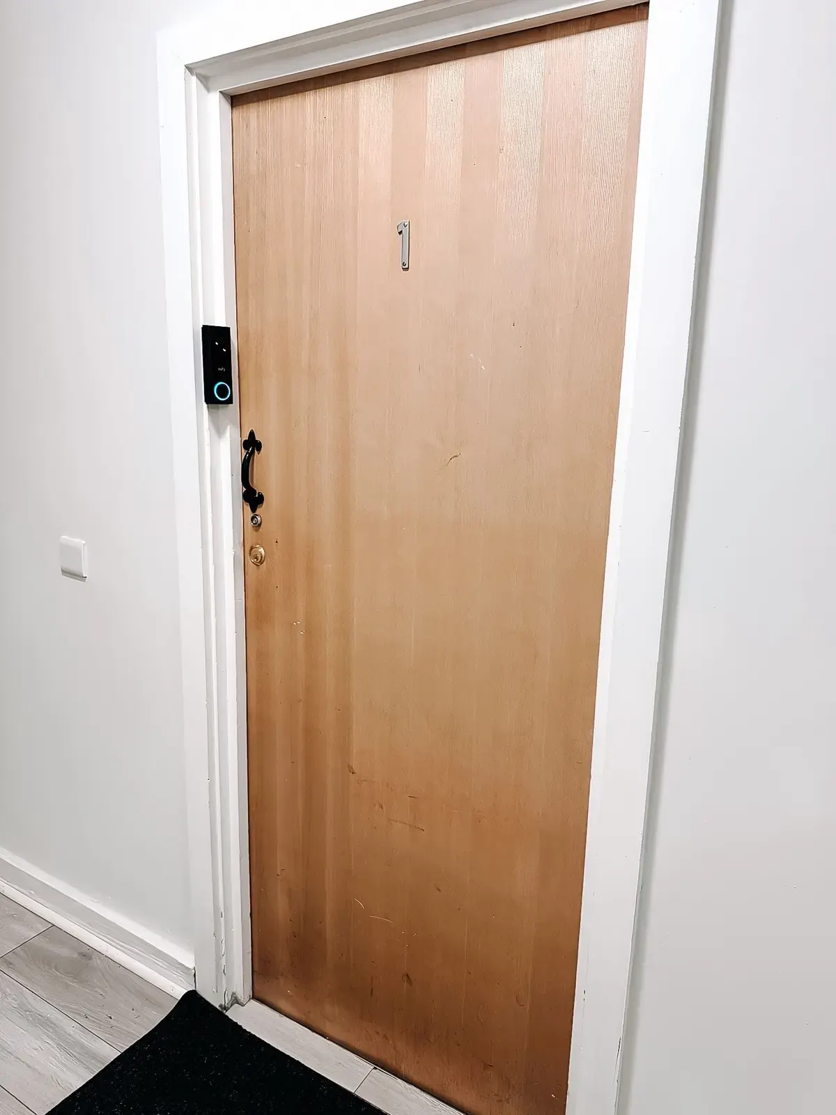 The front door of the flat